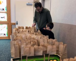 father and son packing lunches